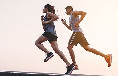 Man and woman running together for exercise