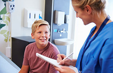 Young boy being vaccinated for HPV